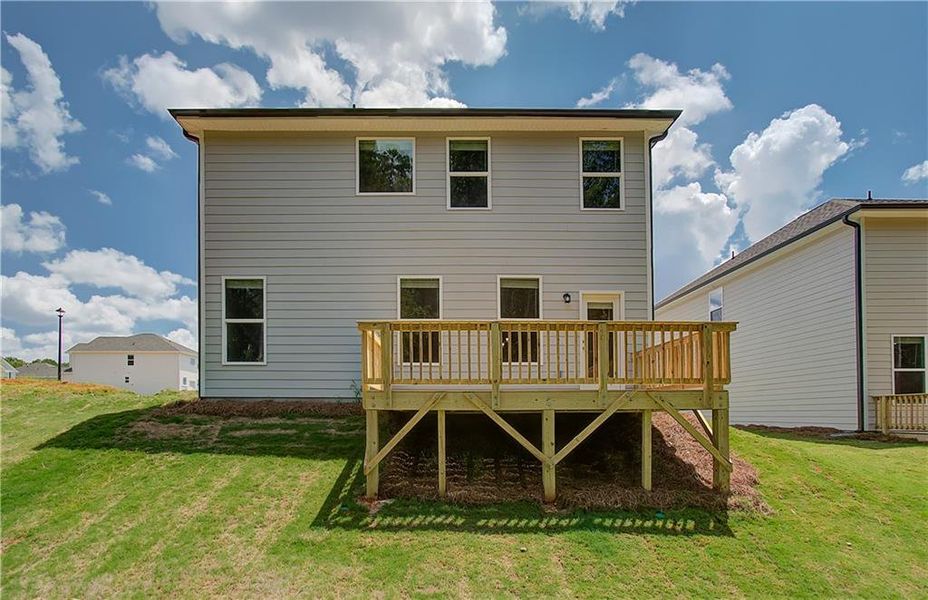 Front exterior of a new home in Enclave at Evergreen, Fairburn, GA, highlighting curb appeal (Image 1).