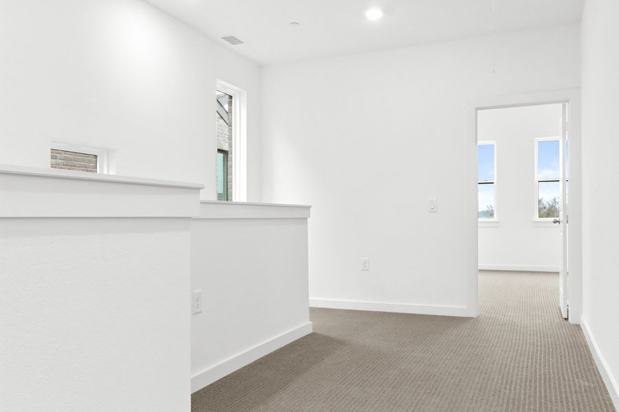 Spacious, unfurnished interior of a new home in Willow Grove Townhomes, Melissa (Image 9).