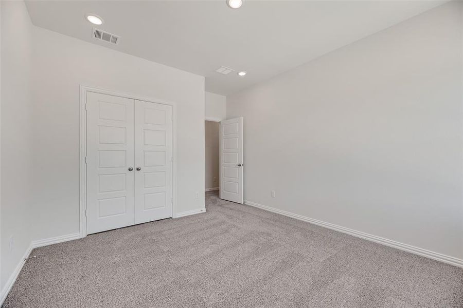 Spacious, unfurnished interior of a new home in Valencia On The Lake, Little Elm (Image 22).