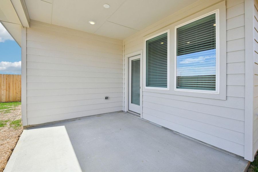 Exterior details and patio area of a home in Sanford Farms - Traditional Series, Waller (Image 3).