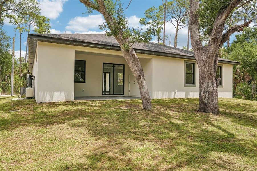 Exterior details and patio area of a home in , Port Charlotte (Image 24).