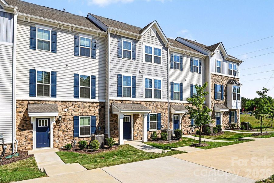 Front exterior of a new home in , Charlotte, NC, highlighting curb appeal (Image 24). Front exterior of a new home in , Charlotte, NC, highlighting curb appeal (Image 24).