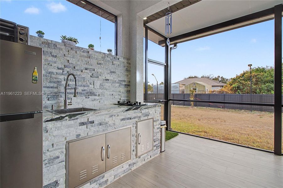 Exterior details and patio area of a home in , Lehigh Acres (Image 25).