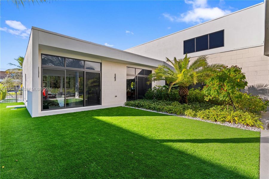 Exterior details and patio area of a home in , Weston (Image 32).
