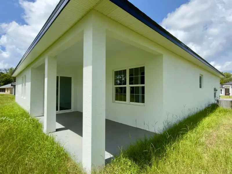 Exterior details and patio area of a home in , Ocala (Image 31).