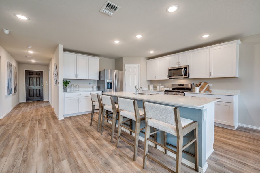 Representative furnished interior of a home built from the Stockdale by Centex in Mobberly Farms, Pilot Point (Image 14).