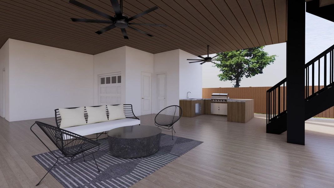 this premium outdoor oasis features an impressive, warm wood-planked ceiling equipped with dual oversized, modern industrial ceiling fans to keep you cool year-round. The space transitions effortlessly from a spacious lounge setup into a high-end summer kitchen, complete with a built-in stainless steel grill, sink, and custom cabinetry.