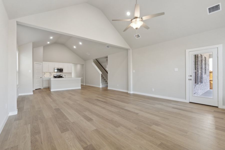 Living Room in the Claret home plan by Trophy Signature Homes – REPRESENTATIVE PHOTO