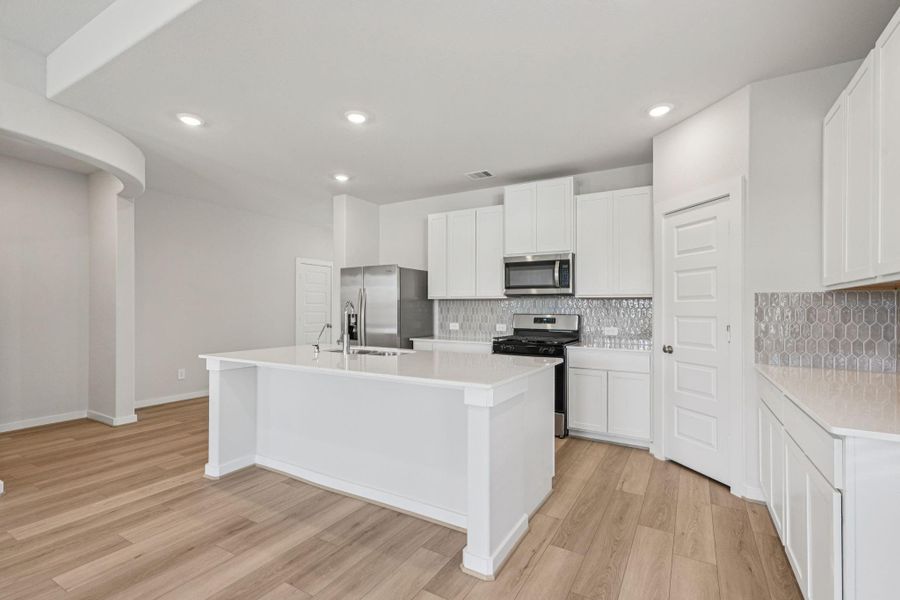 Photo is not of the actual home, but is an inspirational photo of builder’s model home and may depict options, furnishings, and/or decorator features that are not included