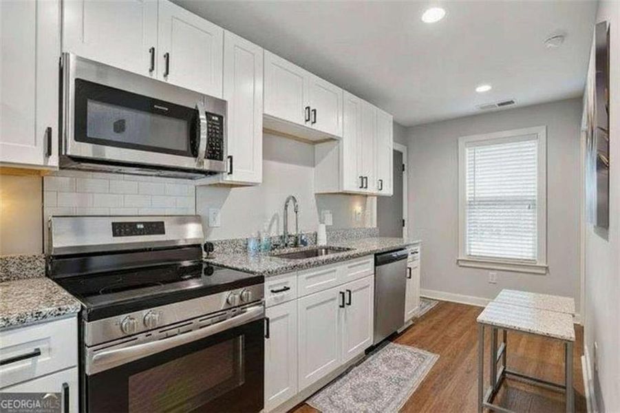 Furnished interior view inside a new home in , Atlanta (Image 5).