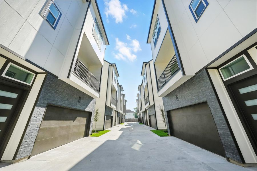 Sophisticated gated community with 3-story homes featuring clean architectural lines, private driveways, and attached garages. This well-designed layout offers a sleek, uniform streetscape with easy access and a low-maintenance lifestyle. Sophisticated gated community with 3-story homes featuring clean architectural lines, private driveways, and attached garages. This well-designed layout offers a sleek, uniform streetscape with easy access and a low-maintenance lifestyle.