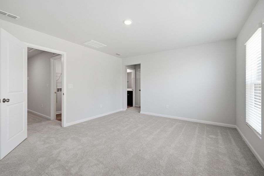 Spacious, unfurnished interior of a new home in Carpenter Falls, Durham (Image 35).
