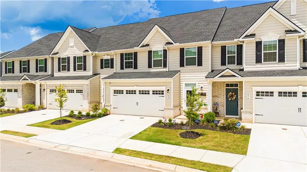 Front exterior of a new home in , McDonough, GA, highlighting curb appeal (Image 2). Front exterior of a new home in , McDonough, GA, highlighting curb appeal (Image 2).