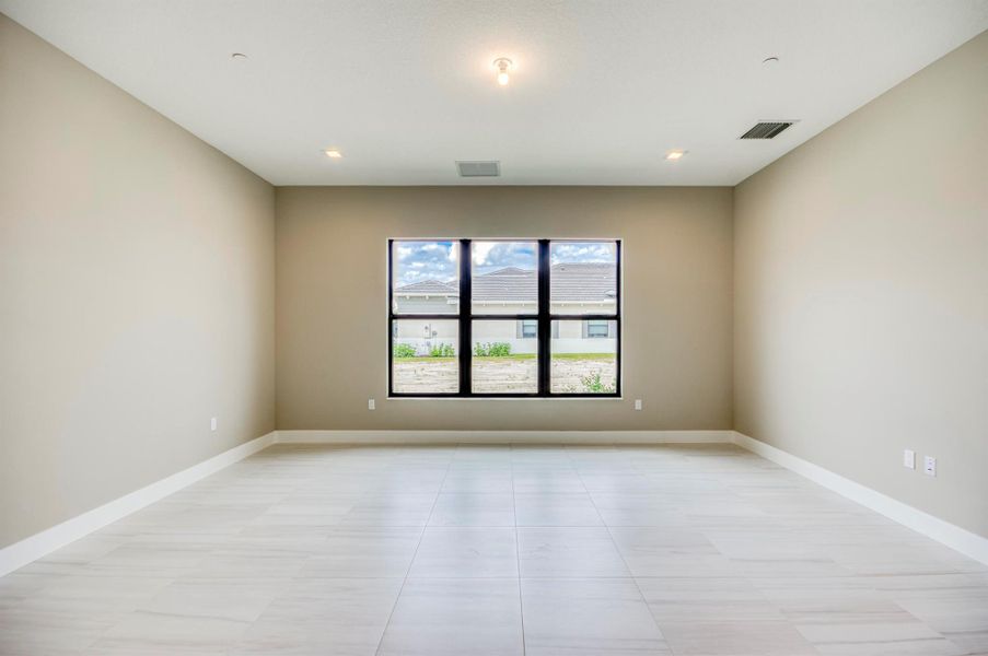 Furnished interior view inside a new home in Apex at Avenir, Palm Beach Gardens (Image 40).