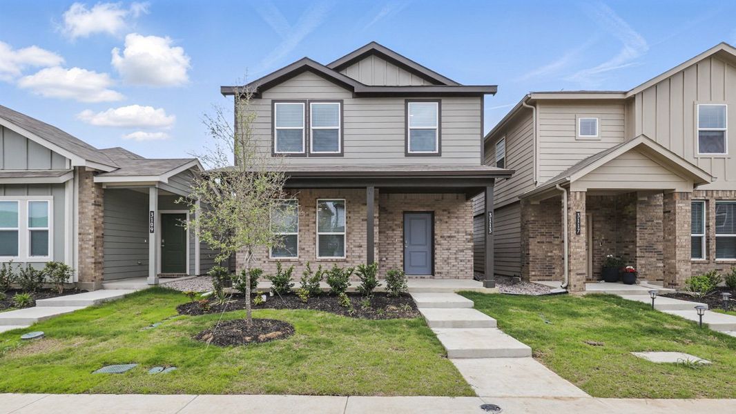 Representative exterior photo of a completed home built from the HAZELNUT by D.R. Horton in Orchard Village, Fort Worth, TX (Image 1).