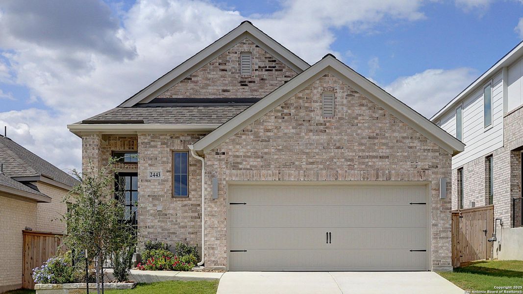 Front exterior of a new home in Ladera 40', San Antonio, TX, highlighting curb appeal (Image 26). Front exterior of a new home in Ladera 40', San Antonio, TX, highlighting curb appeal (Image 26).