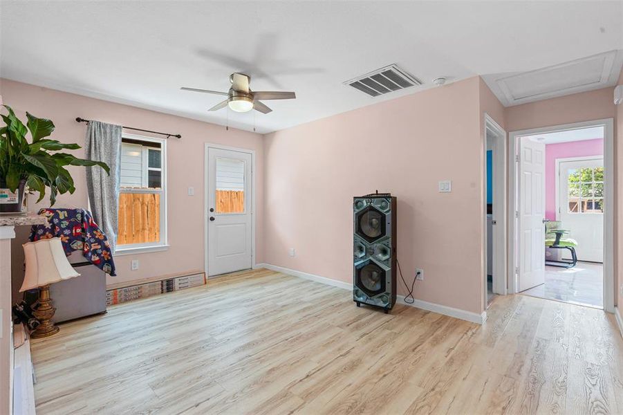Entryway featuring light wood finished floors and plenty of natural light Entryway featuring light wood finished floors and plenty of natural light