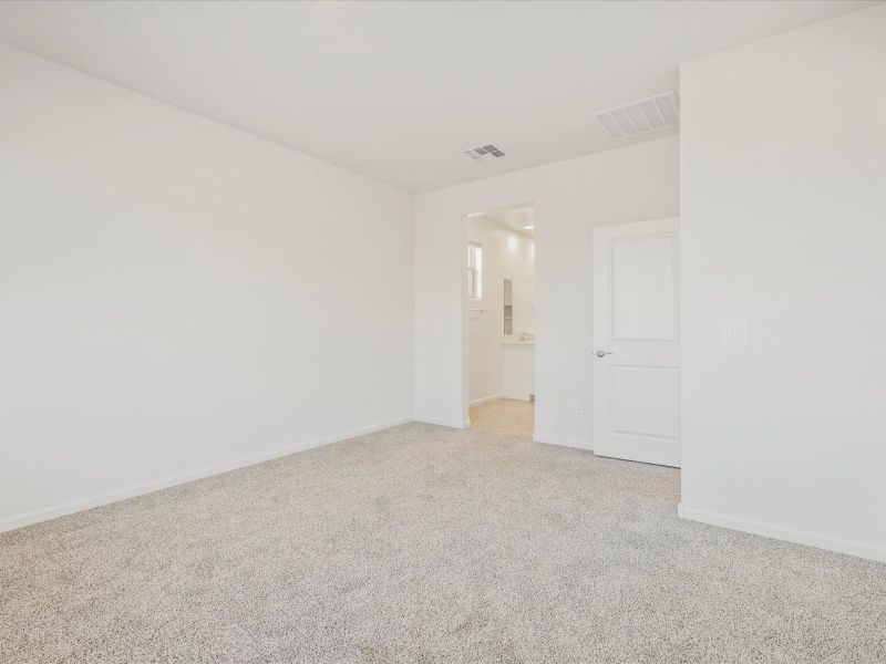 Spacious, unfurnished interior of a new home in Las Patrias at Star Valley Phase III - Premier Series, Tucson (Image 11).