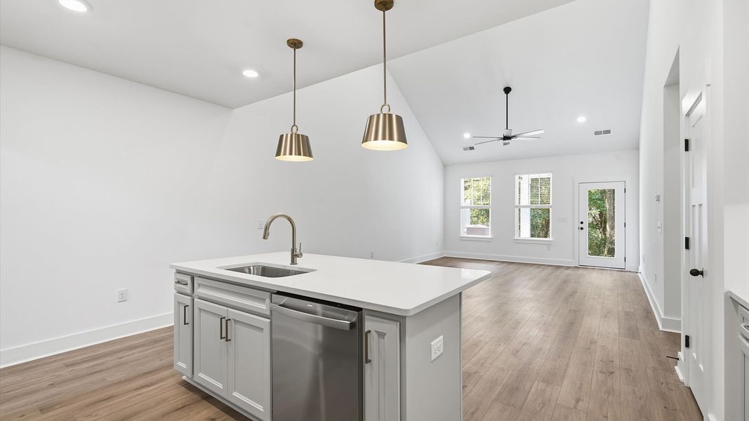 Accomplished design in a kitchen that blends function and form with a right-sized island Accomplished design in a kitchen that blends function and form with a right-sized island