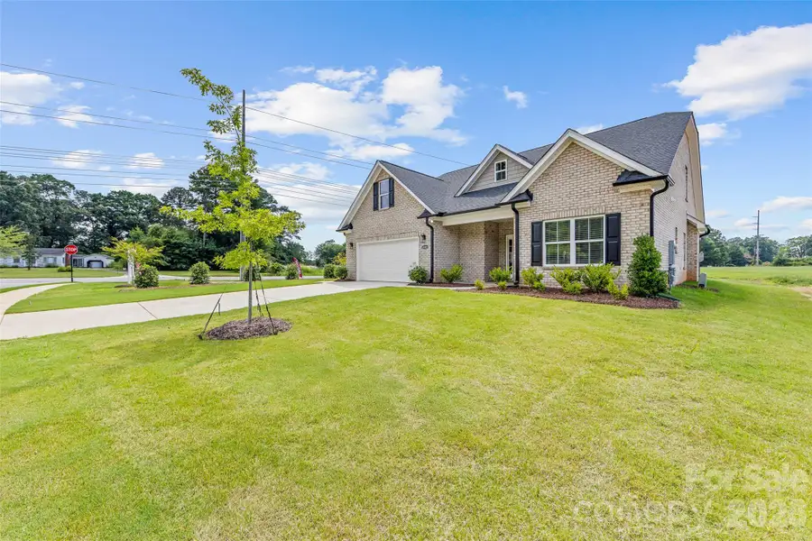 Front exterior of a new home in , Waxhaw, NC, highlighting curb appeal (Image 2). Front exterior of a new home in , Waxhaw, NC, highlighting curb appeal (Image 2).