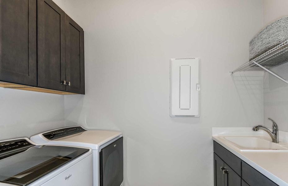 Laundry Room with Sink and Built-In Cabinets