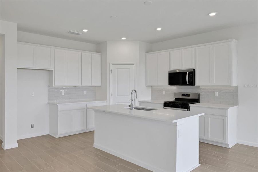 Furnished interior view inside a new home in Brystol North at Wylder, Port St. Lucie (Image 14).