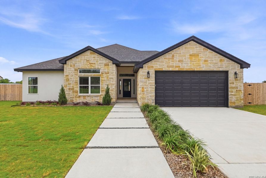 Front exterior of a new home in , Hondo, TX, highlighting curb appeal (Image 1). Front exterior of a new home in , Hondo, TX, highlighting curb appeal (Image 1).