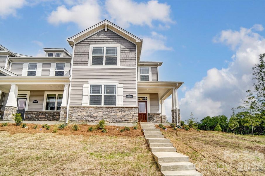 Front exterior of a new home in Cheyney, Charlotte, NC, highlighting curb appeal (Image 24).
