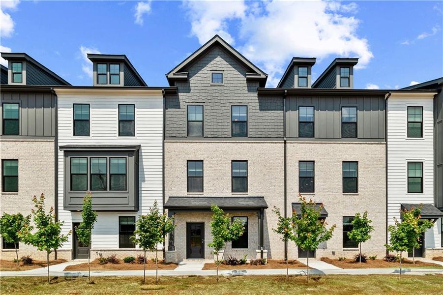 Front exterior of a new home in Silverock, McDonough, GA, highlighting curb appeal (Image 26).