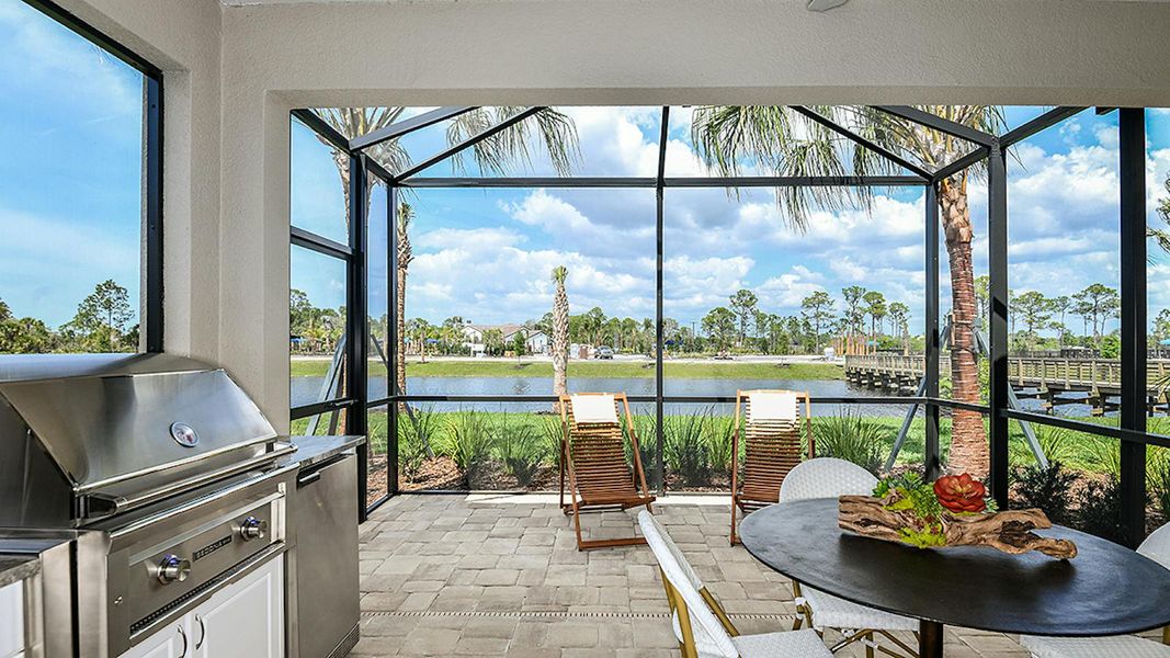 Exterior details and patio area of a home in Vicenza Real Estate and Homes for Sale in North Venice, FL - Neal Communities, Nokomis (Image 21). Exterior details and patio area of a home in Vicenza Real Estate and Homes for Sale in North Venice, FL - Neal Communities, Nokomis (Image 21).