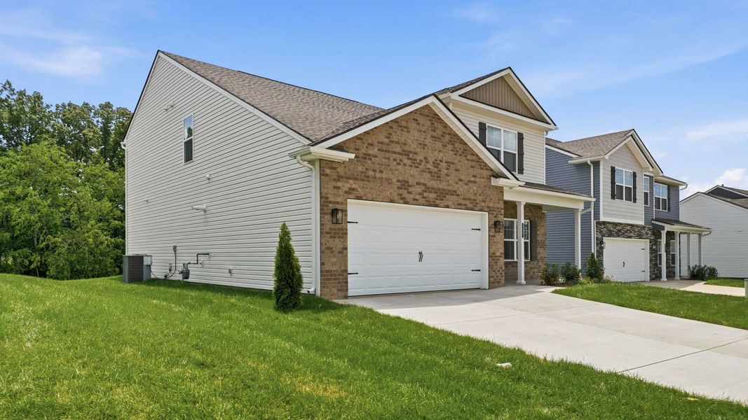 Front exterior of a new home in Fieldcrest Acres, Blountville, TN, highlighting curb appeal (Image 2). Front exterior of a new home in Fieldcrest Acres, Blountville, TN, highlighting curb appeal (Image 2).