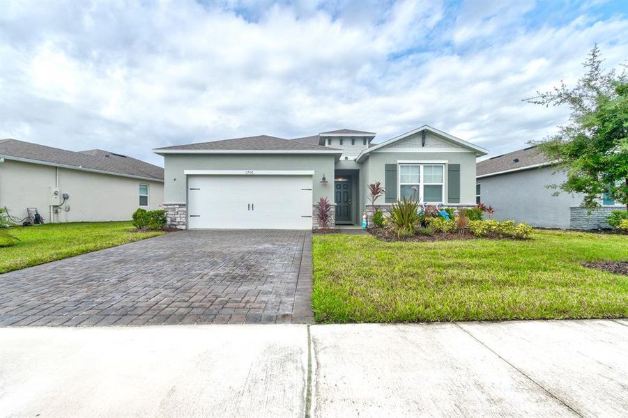 Front exterior of a new home in , New Smyrna Beach, FL, highlighting curb appeal (Image 18).