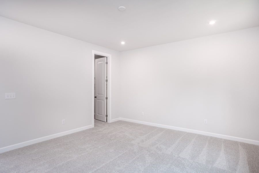 Representative unfurnished interior of a home built from the Kinston by Tri Pointe Homes in Elm Park, Raleigh (Image 19).