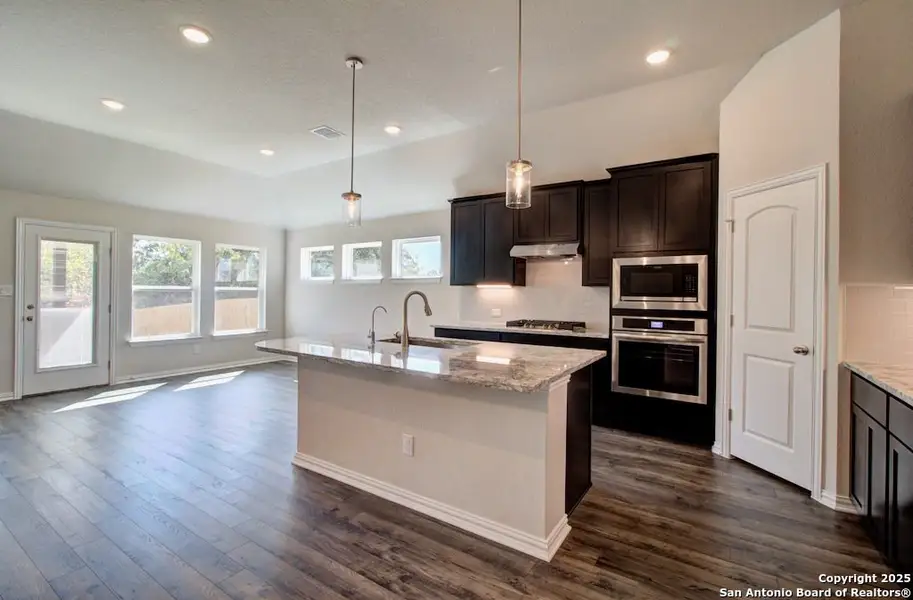 Furnished interior view inside a new home in Veranda, San Antonio (Image 6).