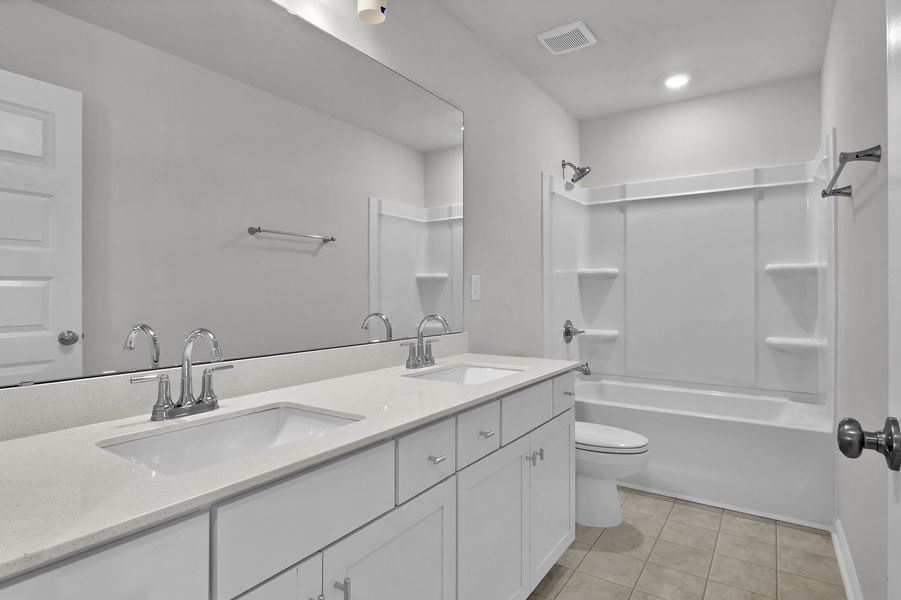 Furnished interior view inside a new home in Grand Park, Leland (Image 11). Furnished interior view inside a new home in Grand Park, Leland (Image 11).