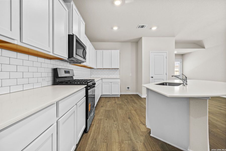 Furnished interior view inside a new home in Redbird Ranch, San Antonio (Image 6).