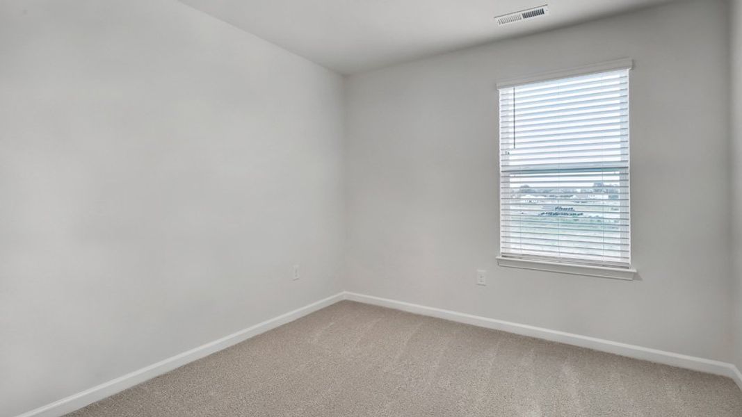 Spacious, unfurnished interior of a new home in The Townes at Honeycutt Oaks, Angier (Image 20).