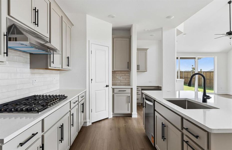 Kitchen with eat-in bartop island