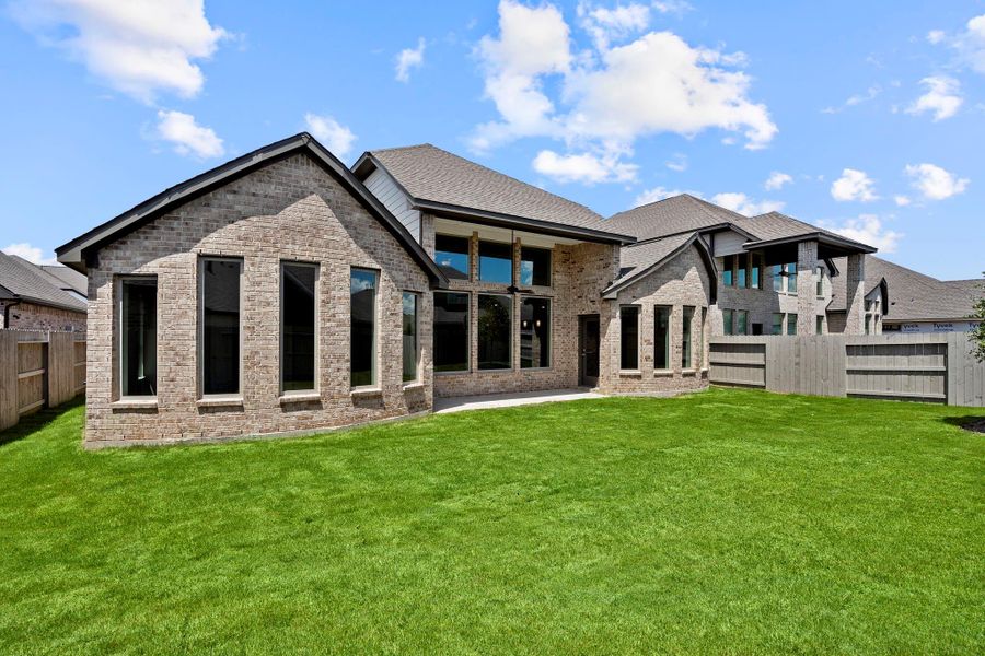 Front exterior of a new home in Pomona 60', Manvel, TX, highlighting curb appeal (Image 20). Front exterior of a new home in Pomona 60', Manvel, TX, highlighting curb appeal (Image 20).