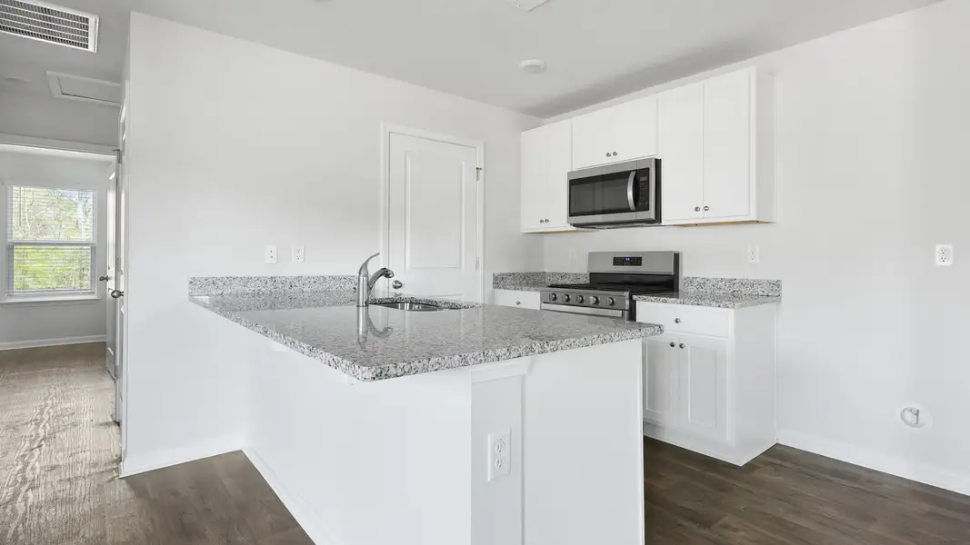Representative furnished interior of a home built from the WYETH-DUPLEX by D.R. Horton in The Timbers, Harleyville (Image 3). Representative furnished interior of a home built from the WYETH-DUPLEX by D.R. Horton in The Timbers, Harleyville (Image 3).