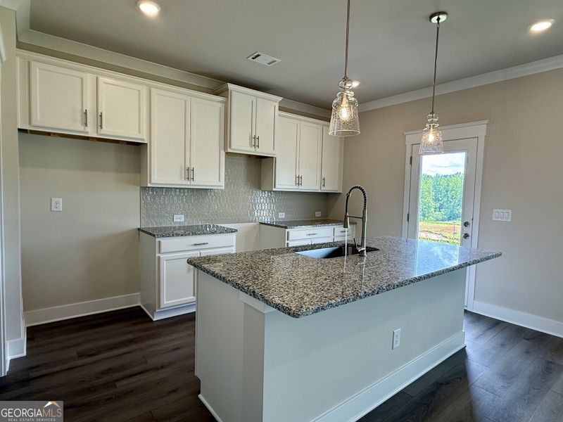 Furnished interior view inside a new home in Enclave at Logan Point, Loganville (Image 3).