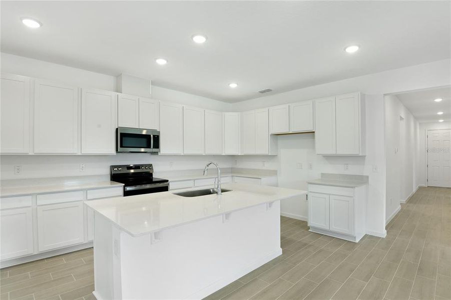 Furnished interior view inside a new home in Seasons at Grandview Gardens, Deland (Image 6).