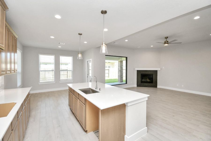This generously spacious kitchen is a dream realized! Sample photo of completed home with similar floor plan. Actual colors and selections may vary. This generously spacious kitchen is a dream realized! Sample photo of completed home with similar floor plan. Actual colors and selections may vary.