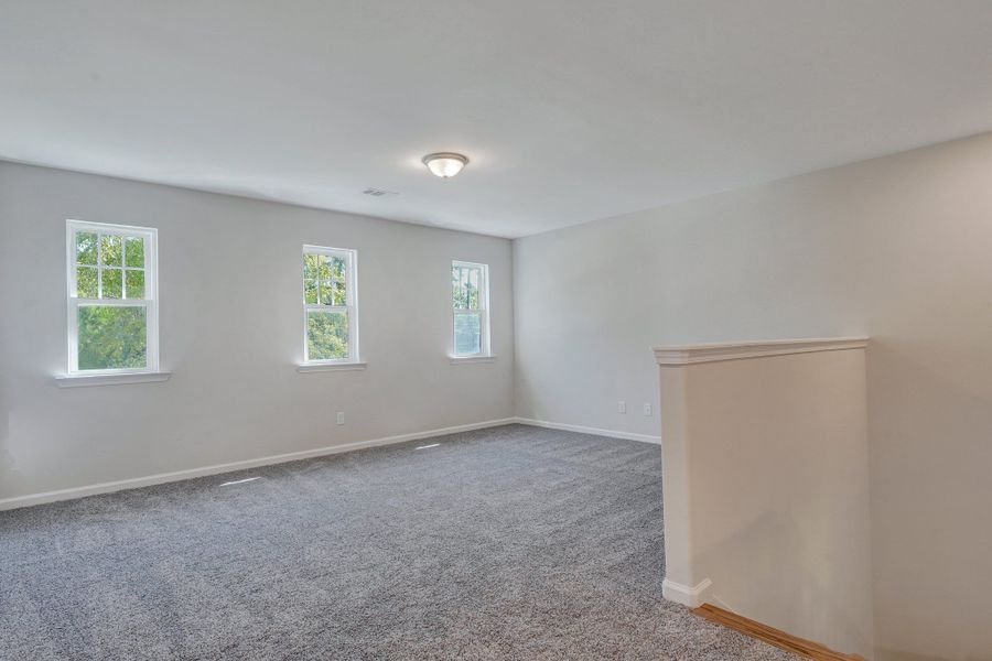 Representative unfurnished interior of a home built from the The Stonecrest by Smith Family Homes in Ramsey Landing, Rincon (Image 32).