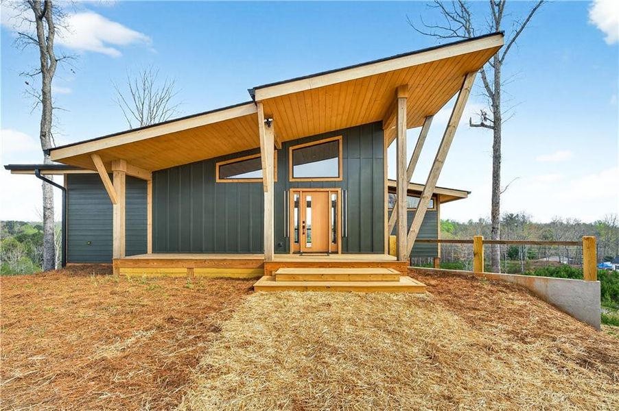 Exterior details and patio area of a home in , Ellijay (Image 29).