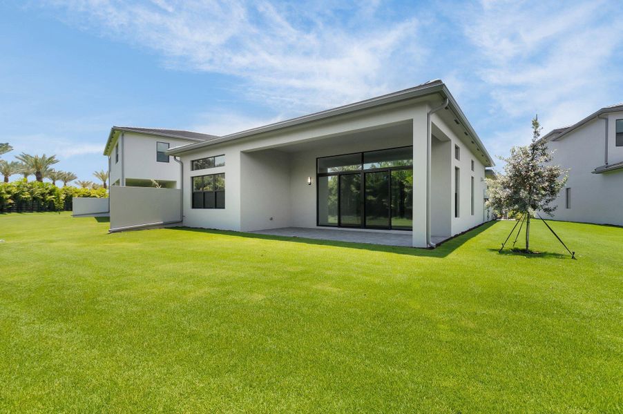 Exterior details and patio area of a home in Lotus Edge, Boca Raton (Image 2). Exterior details and patio area of a home in Lotus Edge, Boca Raton (Image 2).