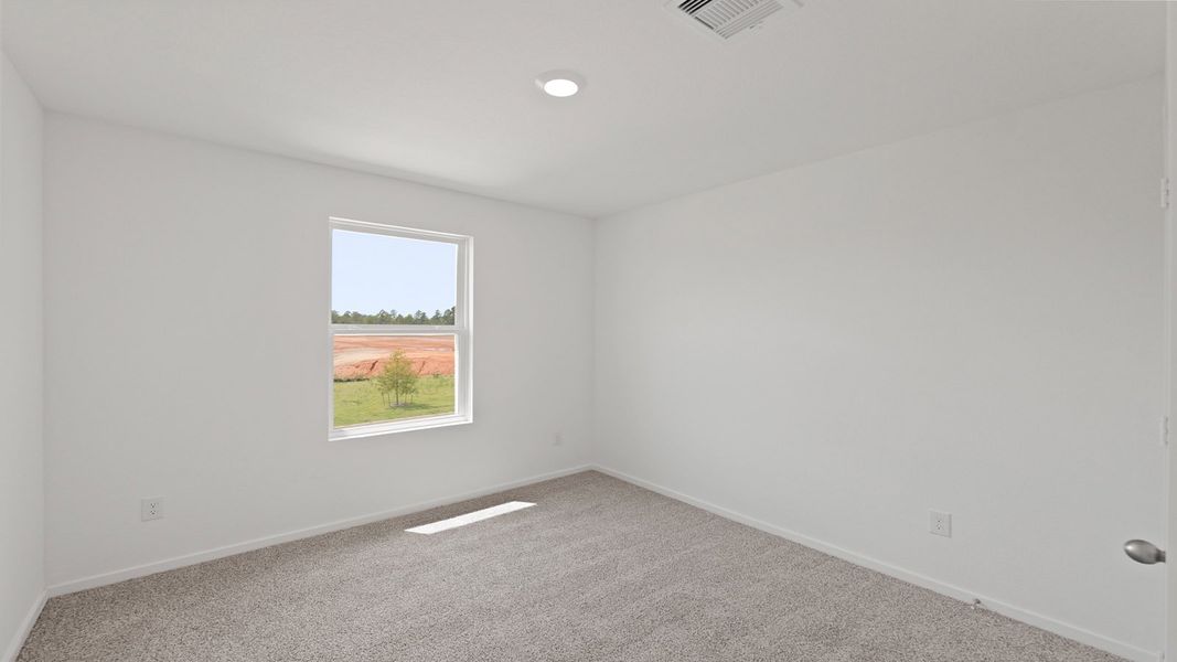 Representative unfurnished interior of a home built from the Davis by D.R. Horton in Lake Conroe Cove, Willis (Image 20).