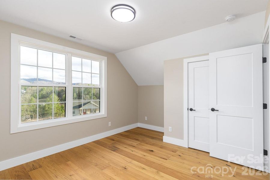 "The Laurel". Upper level Bedroom #1. Representative photo from Corner Rock Builders showing similar floorplan, craftsmanship, quality of construction and finish level. "The Laurel". Upper level Bedroom #1. Representative photo from Corner Rock Builders showing similar floorplan, craftsmanship, quality of construction and finish level.
