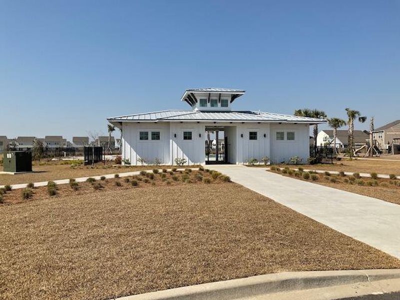 Front exterior of a new home in Pender Woods at Cane Bay, Summerville, SC, highlighting curb appeal (Image 19).