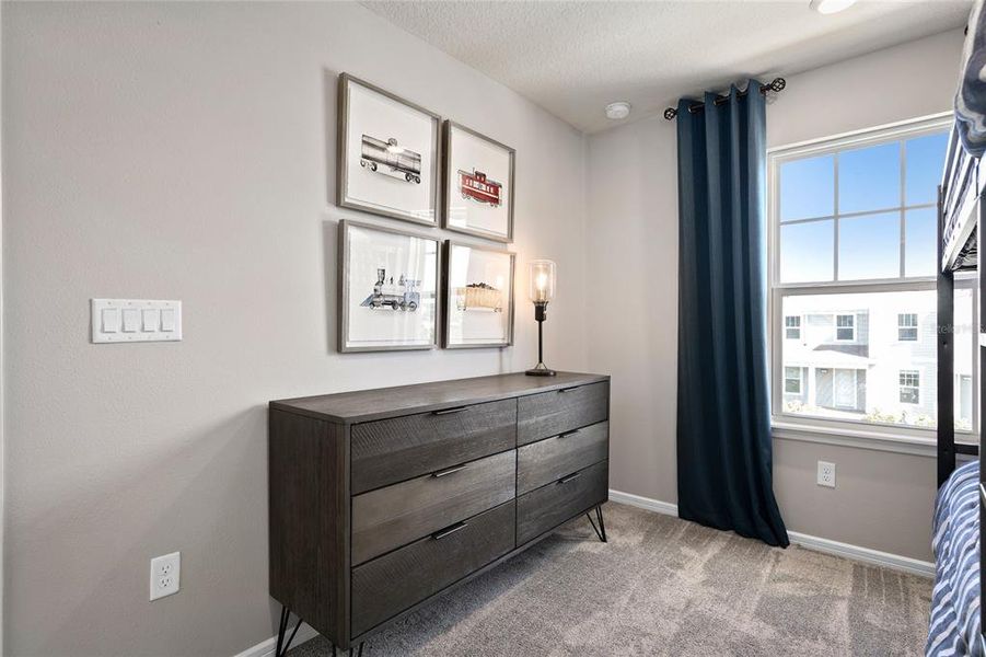 Furnished interior view inside a new home in Parkside Trails, Clermont (Image 25).